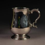 GEORGE II SILVER HALF PINT TANKARD BY JACOB FOSTER, of baluster form with leaf capped scroll handle,