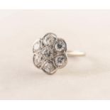 18ct WHITE GOLD AND PLATINUM CLUSTER RING set with seven round brilliant cut diamonds, centre