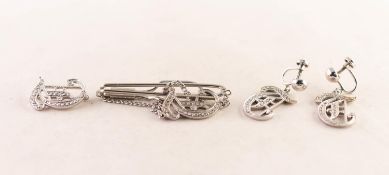 SUITE OF SILVER AND MARCASITE JEWELLERY, based on an open work monogram, comprising a pair of drop