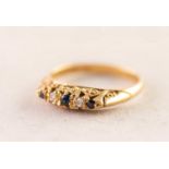 SAPPHIRE AND DIAMOND 18ct GOLD FIVE STONE RING with carved setting, hallmarked 1976, 3.13gms, ring