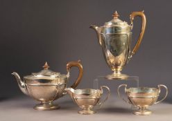 EARLY 20th CENTURY SILVER FOUR PIECE TEA & COFFEE SERVICE, THE TEA AND COFFEE POTS with wooden