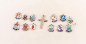 12 SMALL SILVER AND ENAMELLED SOUVENIR SHIELD SHAPED CHARMS bearing town crests - Harlech,