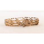 9ct GOLD PATTERN BRACELET with saltire bars and the 9ct gold engraved padlock clasp, 14gms