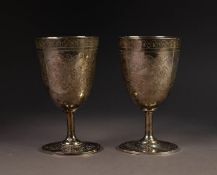 PAIR OF TURKISH ENGRAVED SILVER GOBLETS, each of typical form, decorated with birds and flowers,