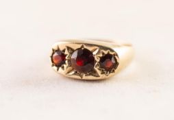 9ct GOLD RING with three garnets in star settings, London 1975, 4.5 gms, ring size Q/R