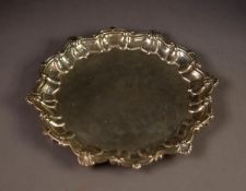 EARLY 20th CENTURY BRITANNIA STANDARD SILVER WAITER with scallop-shell punctuated pie- crust border,