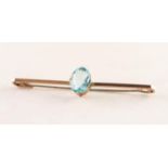 9ct GOLD BAR BROOCH with centre oval pale blue zircon, 2.5gms