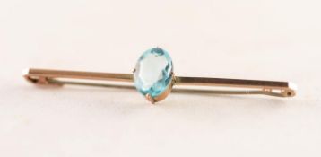 9ct GOLD BAR BROOCH with centre oval pale blue zircon, 2.5gms