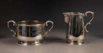 20th CENTURY SILVER TWO HANDLED SUGAR BASIN AND MATCHING CREAM JUG, with leaf-capped scroll handles,