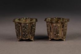 PAIR OF CHINESE EMBOSSED SILVER OPEN SALTS, each of slightly tapering, lobated form, with floral