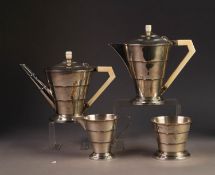 PRE-WAR STYLISHLY ART DECO SILVER FOUR PIECE TEA AND COFFEE SERVICE, of stepped tapered form on