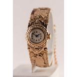 LADY'S BUCHERER SWISS WRISTWATCH with 17 jewels movement, small circular arabic white dial, set in a