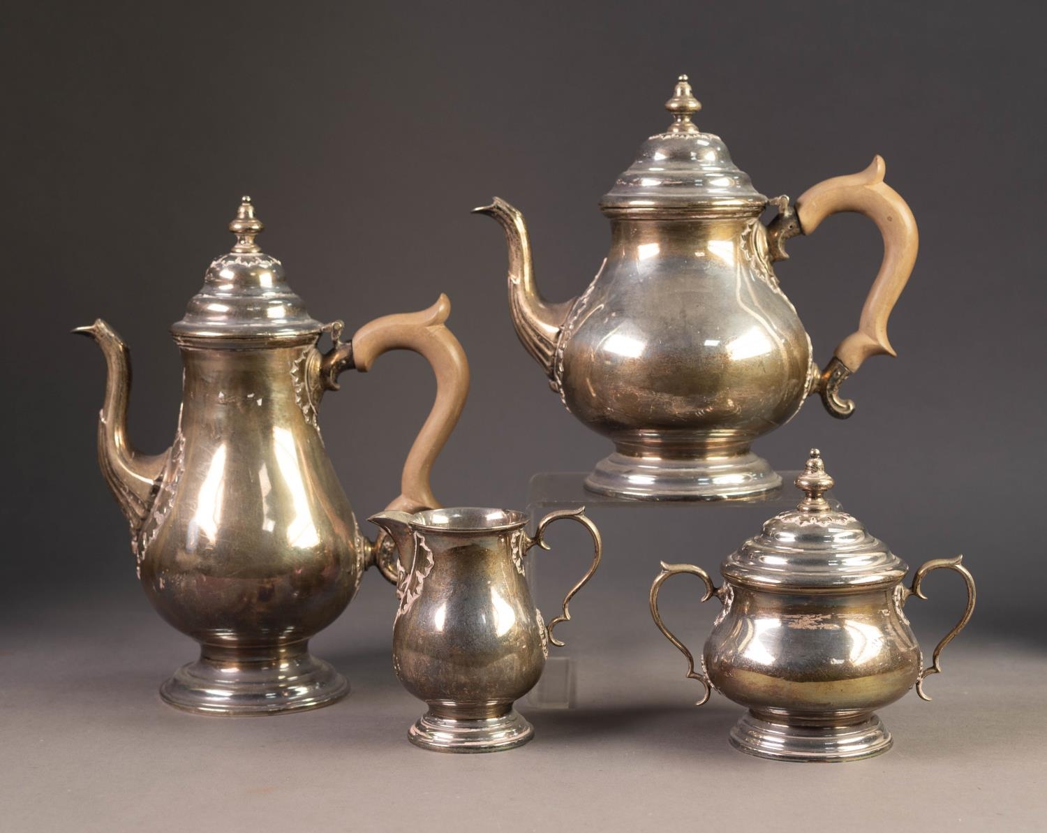 20th CENTURY SILVER GEORGIAN REVIVAL FOUR PIECE TEA AND COFFEE SERVICE, each of baluster shape,