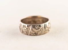 18ct WHITE GOLD BROAD WEDDING RING, chased with flower heads between diagonal lines, London 1994,