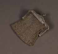 SILVER COLOURED METAL SMALL MESH PURSE, with Art Nouveau floral embossed frame, 2 3/8? (6cm) wide