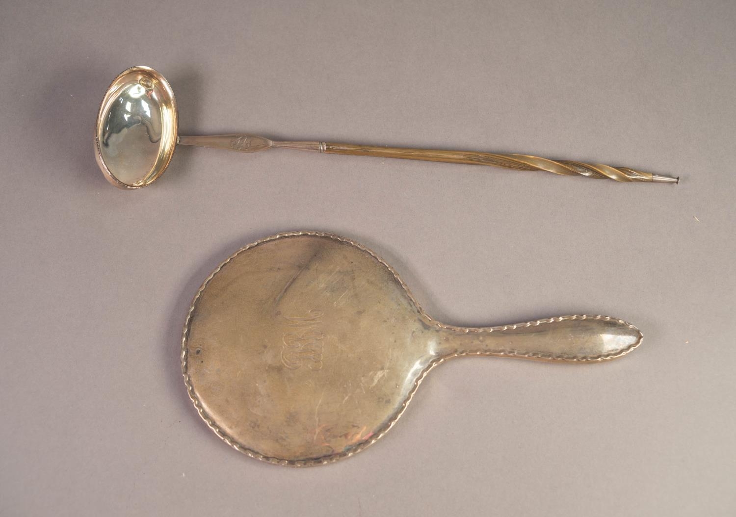 TWO PIECES OF UNMARKED SILVER, comprising: DRESSING TABLE HAND MIRROR, initialled, and a GEORGIAN