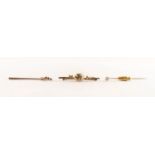 9ct GOLF STICK PIN claw set with a solitaire cubic zirconia; 9ct GOLD BAR BROOCH with applied bow to