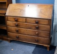 GEORGE III MAHOGANY BUREAU, of typical form with well fitted interior of arch topped pigeon holes,