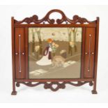 ARTS AND CRAFTS MAHOGANY AND NEEDLEWORK FIRE SCREEN, the pierced, scroll cresting above a glazed