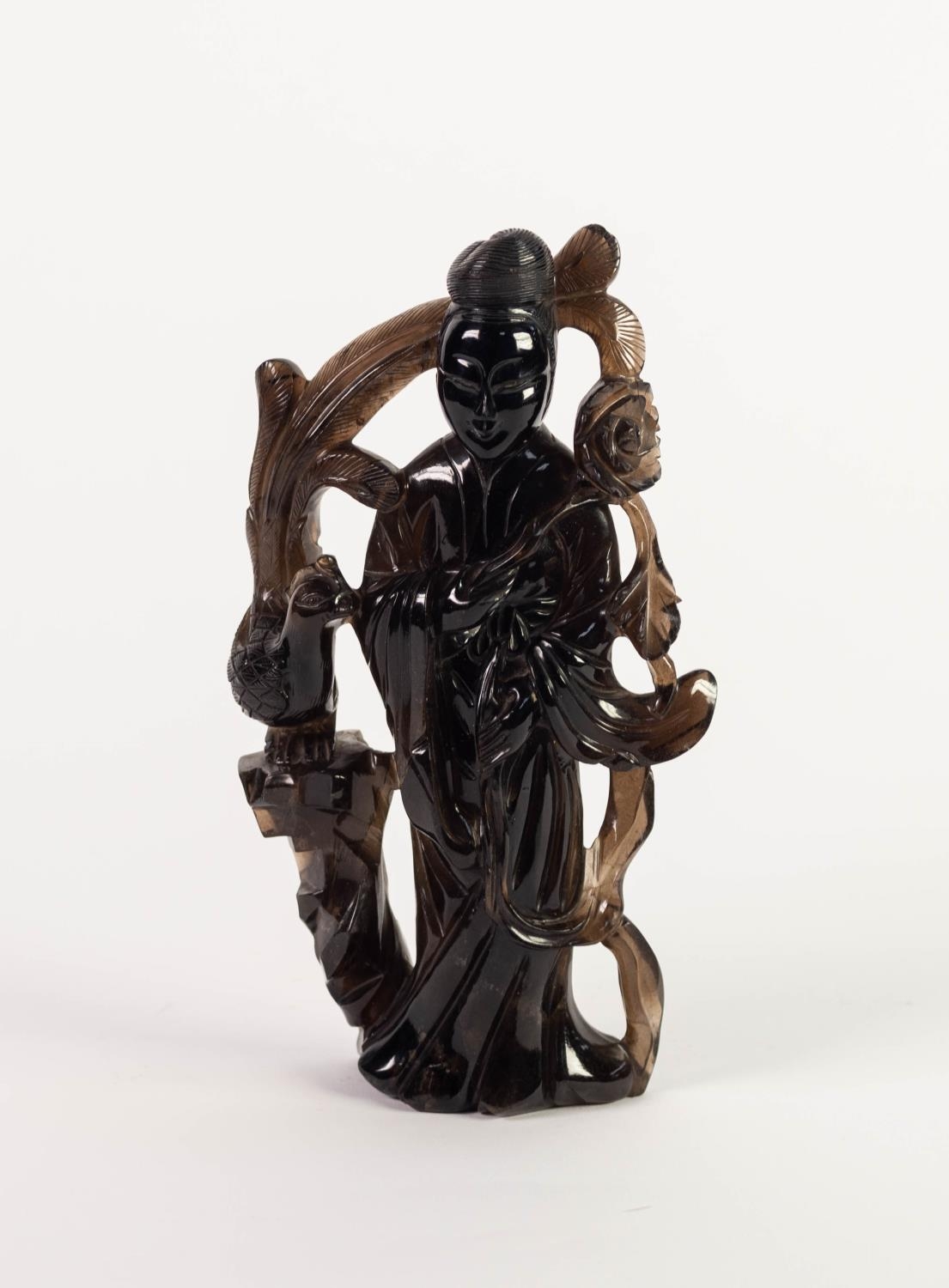 CHINESE CARVED BLACK HARDSTONE FIGURE OF A FEMALE FIGURE, modelled standing, holding a flower,