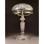 EARLY TWENTIETH CENTURY CUT GLASS TABLE LAMP, the base with slender column, domed foot and