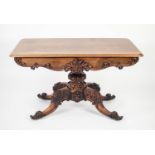 EARLY VICTORIAN CARVED ROSEWOOD PEDESTAL LIBRARY TABLE, the moulded, rounded oblong top above a pair
