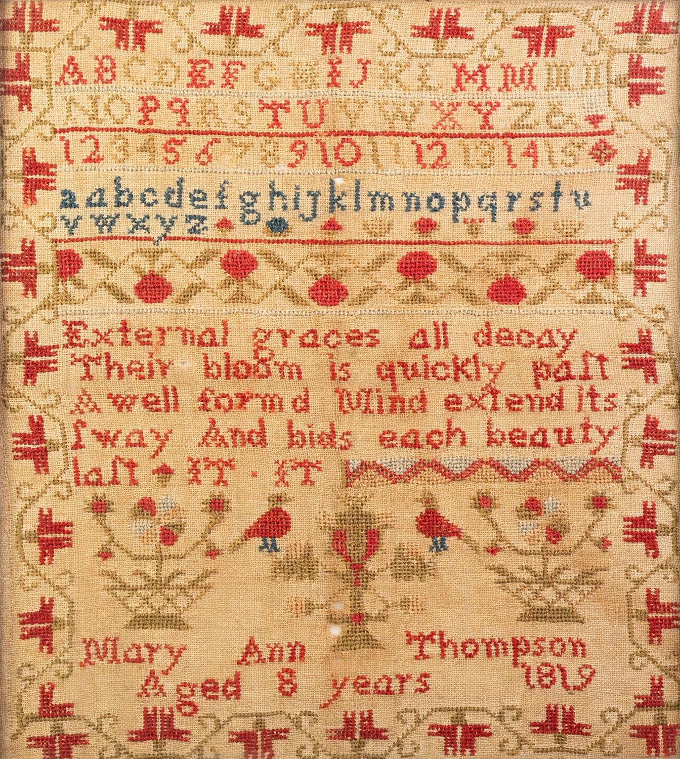 A LATE GEORGE III NEEDLEWORK SAMPLER, worked  with alphabet letters, numerals and a five line verse,