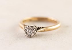 18ct GOLD AND PLATINUM RING with a small brilliant cut solitaire diamond in a deceptive setting,