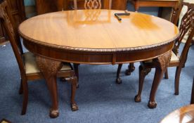 CHIPPENDALE STYLE MAHOGANY OVAL DINING TABLE, with gadroon carved edge, on four acanthus carved