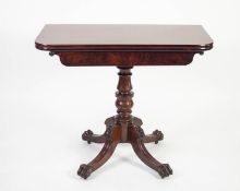 EARLY VICTORIAN CARVED AND FIGURED MAHOGANY PEDESTAL TEA TABLE, the rounded oblong swivel and fold-