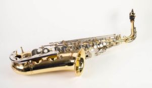 YAMAHA POST-WAR GILT METAL YAS 23 ALTO SAXOPHONE, stamped No 015212 with a mouthpiece (one lower