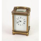 MID 20th CENTURY BRASS TIME PIECE CARRIAGE CLOCK of heavy quality, having round arch folding handle,