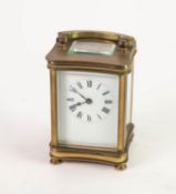 MID 20th CENTURY BRASS TIME PIECE CARRIAGE CLOCK of heavy quality, having round arch folding handle,