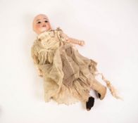 S.F.B.J. TINTED BISQUE SWIVEL HEAD DOLL, stamped SFBJ Co Paris 8/0, having fixed dark blue eyes,