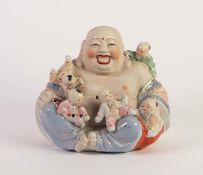 MODERN CHINESE BISQUE PORCELAIN GROUP OF A LAUGHING BUDDHA WITH CHILDREN, heightened in colours
