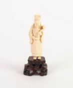 LATE NINETEENTH/ EARLY TWENTIETH CENTURY ORIENTAL CARVED IVORY OKIMONO, modelled as a standing