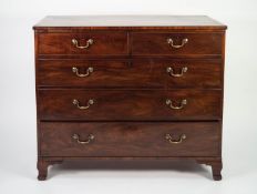 LATE GEORGIAN MAHOGANY CHEST OF DRAWERS, the satinwood crossbanded, oblong top above two short and