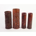 FOUR CHINESE CARVED BAMBOO BITONGS OR BRUSH POTS, each of typical form, one carved with warriors,