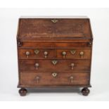 EIGHTEENTH CENTURY OAK BUREAU, of typical form, with two short drawers over two long drawers, fitted