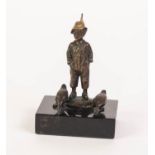 CAST FROM A MODEL BY L. SRAFAER (early 20th Century), SMALL BRONZE MODEL OF A YOUNG BOY, with two