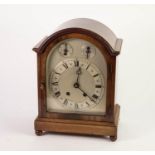 EARLY 20th CENTURY GEORGIAN STYLE FIGURED MAHOGANY MANTEL CLOCK, coach topped with 8 days