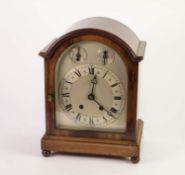 EARLY 20th CENTURY GEORGIAN STYLE FIGURED MAHOGANY MANTEL CLOCK, coach topped with 8 days