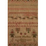 WILLIAM IV ALPHABET SAMPLER DECORATED WITH FLOWERING SHRUBS AND STRAWBERRIES, inscribed Anne