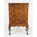 QUEEN ANNE STYLE REPRODUCTION FIGURED AND CROSSBANDED WALNUT CHEST ON STAND, the moulded top above