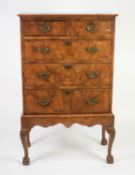 QUEEN ANNE STYLE REPRODUCTION FIGURED AND CROSSBANDED WALNUT CHEST ON STAND, the moulded top above