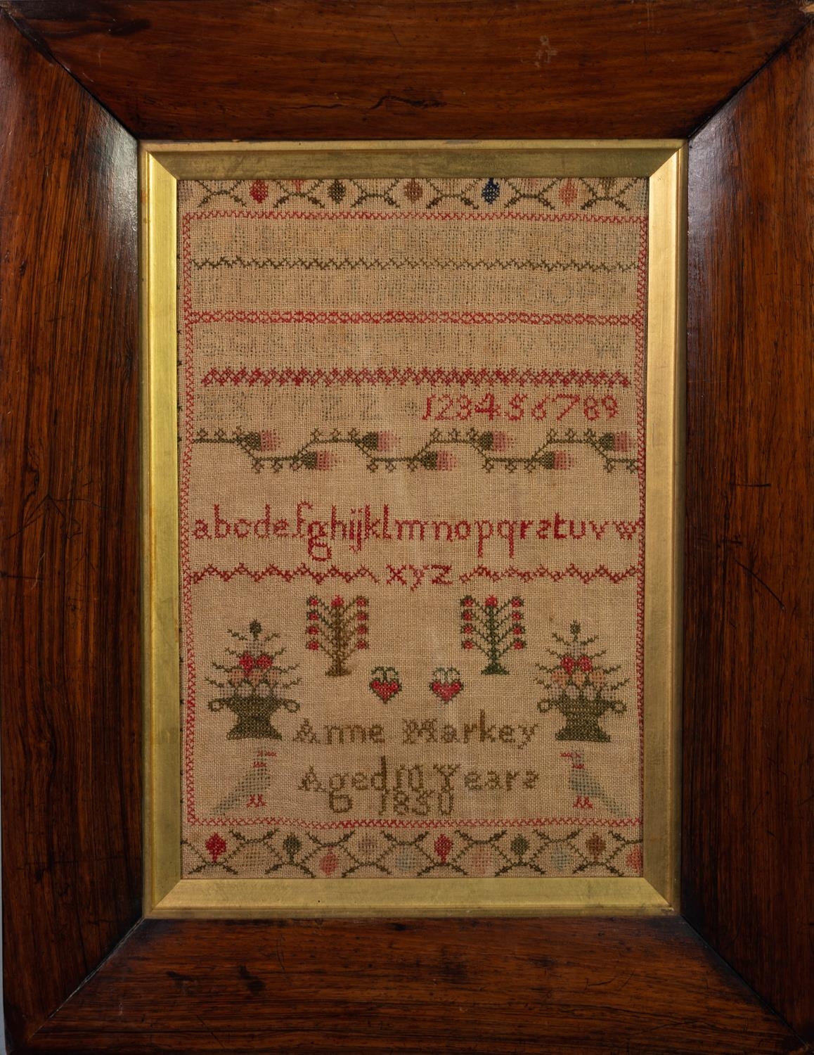 WILLIAM IV ALPHABET SAMPLER DECORATED WITH FLOWERING SHRUBS AND STRAWBERRIES, inscribed Anne - Image 2 of 2