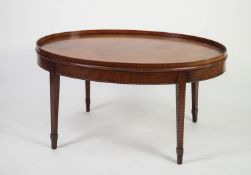 GEORGIAN STYLE FLAME CUT MAHOGANY AND LINE INLAID OCCASIONAL, the oval tray type, galleried top, set