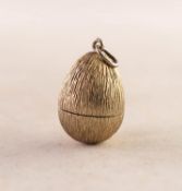 STUART DEVLIN TEXTURED SILVER GILT EGG SHAPED PENDANT, hinge opening to reveal bouquet of coloured