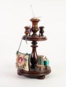 LATE VICTORIAN TURNED MAHOGANY COTTON BOBBIN STAND of two circular graduated tiers, with a total