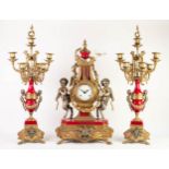 MODERN ?IMPERIAL?, ITALIAN GILT METAL AND RED PAINTED METAL THREE PIECE CLOCK GARNITURE, THE CLOCK